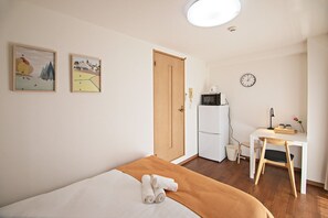 1 dormitorio, escritorio, wifi gratis y ropa de cama