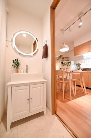 Hair dryer, towels, soap, shampoo