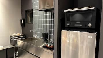 Fridge, microwave, cookware/dishes/utensils