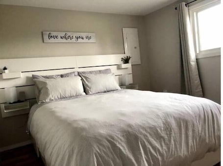 1 bedroom, iron/ironing board, free WiFi, bed sheets. Comfy and modern private suite - everything you need for a short to midterm stay