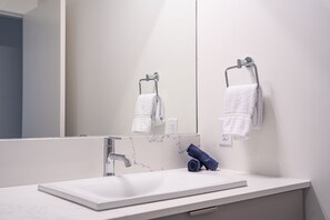 Condo | Bathroom | Hair dryer, towels