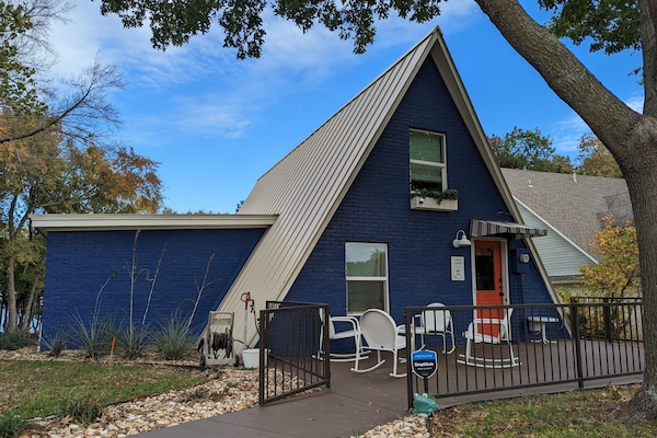 Camp Coffee on Lake Texoma - Enjoy this unique, vibrant A-frame lake front home!