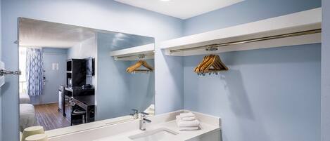 Room, 2 Queen Beds | Bathroom | Hair dryer, towels, soap, shampoo