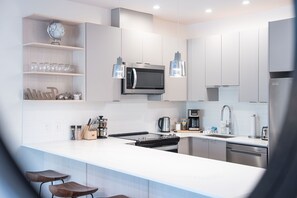 Condo, 2 Bedrooms | Private kitchen | Full-size fridge, microwave, oven, stovetop - Mountainside Revival Revelstoke Vacations (Revelstoke)