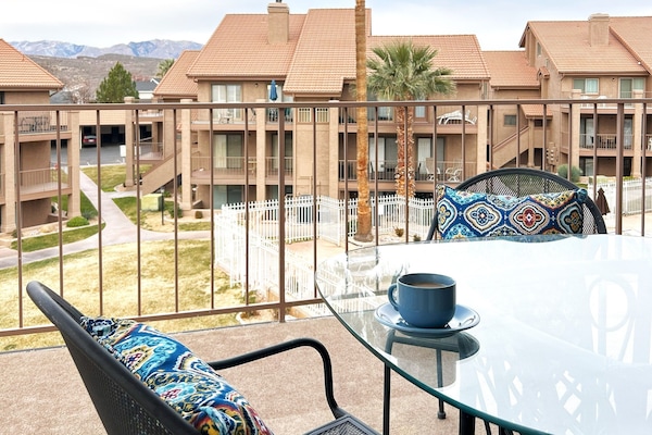 Daytime view from balcony, beautiful palm trees and mountain view