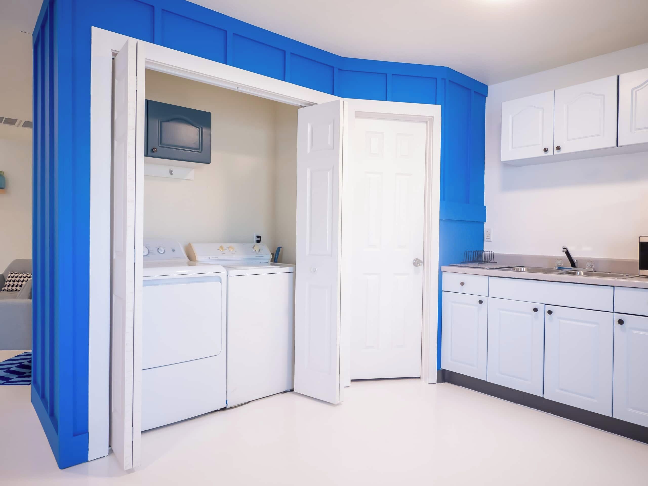 Kitchenette with washer and dryer in a closet