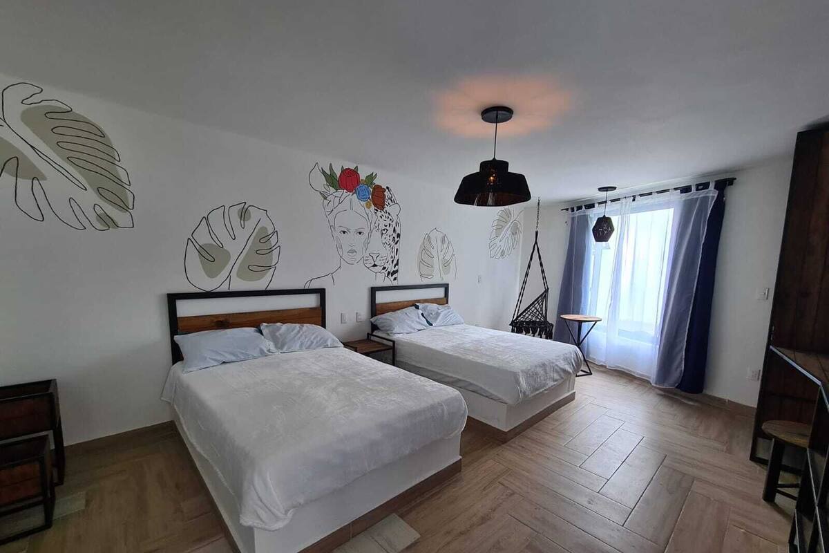 Family Room | Desk, blackout curtains, free WiFi, individually decorated