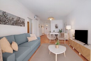 TV - Holiday Apartment 'T2 E Apt Eucalipto' with Shared Pool, Balcony & Wi-Fi (Santa Luzia)