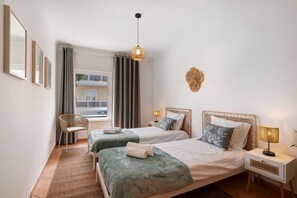 2 slaapkamers, een strijkplank/strijkijzer, gratis wifi, beddengoed