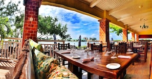 Outdoor dining - Romantic Ocean Front Sea Palm Villa #7 (Grand Cayman)