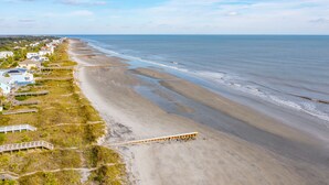A coastal area with a beach, houses, and a wooden boardwalk. - 2 Incredible Units Equal Double the Amenities! Lazy Mermaid (Folly Beach)