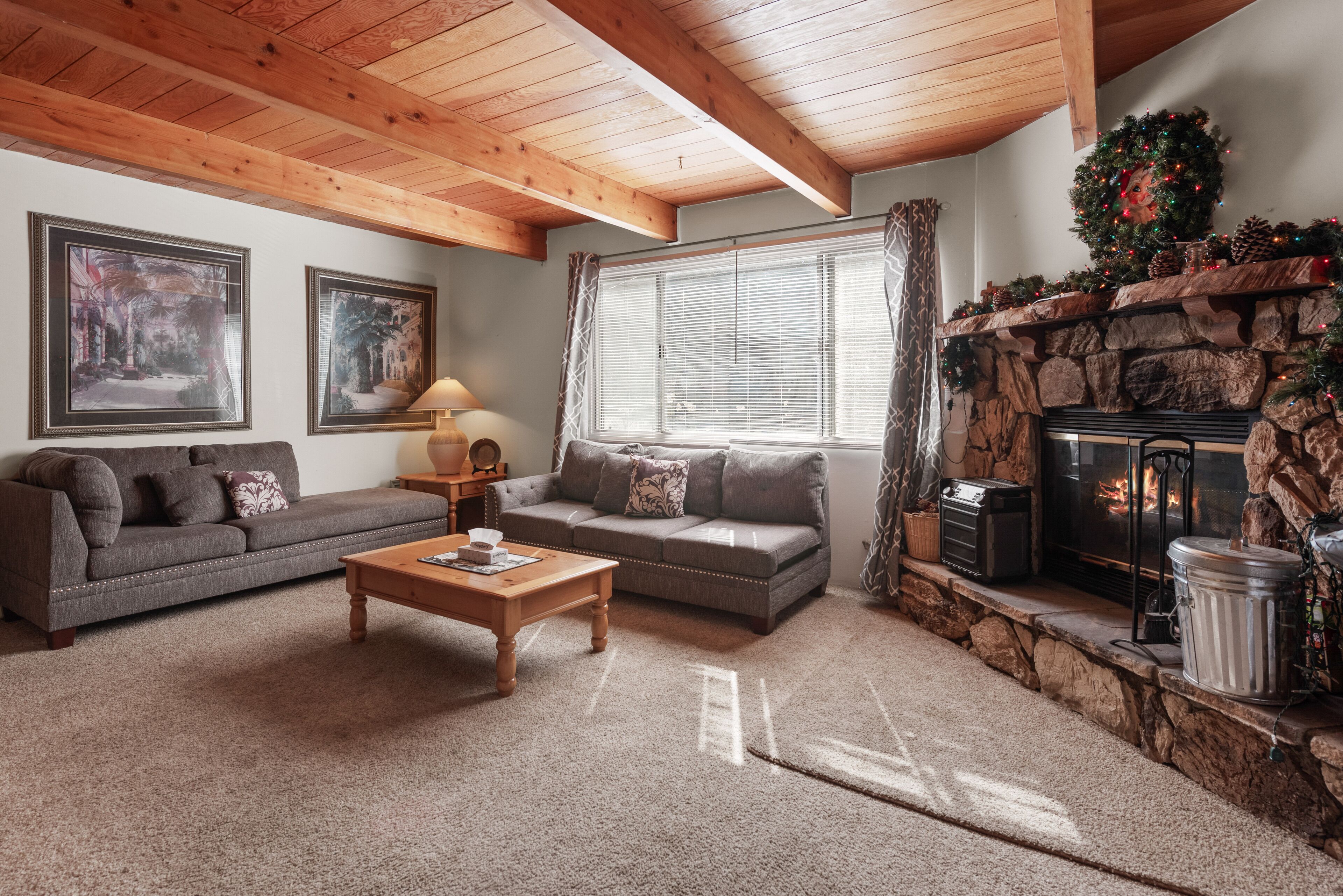 Los Lobos Cabin - A cozy and spacious gambrel-style cabin surrounded by pines.