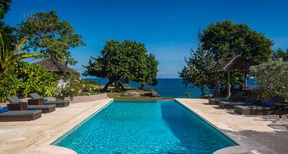 A beautifully renovated Caribbean Villa fronting a private seaside cove.