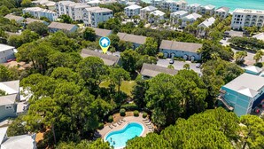 A resort with multiple buildings, a swimming pool, and a view of the ocean. - Cassine- 3 Min to Beach, 2 BR, Pool, Bikes, Tennis & Beach (Santa Rosa Beach)