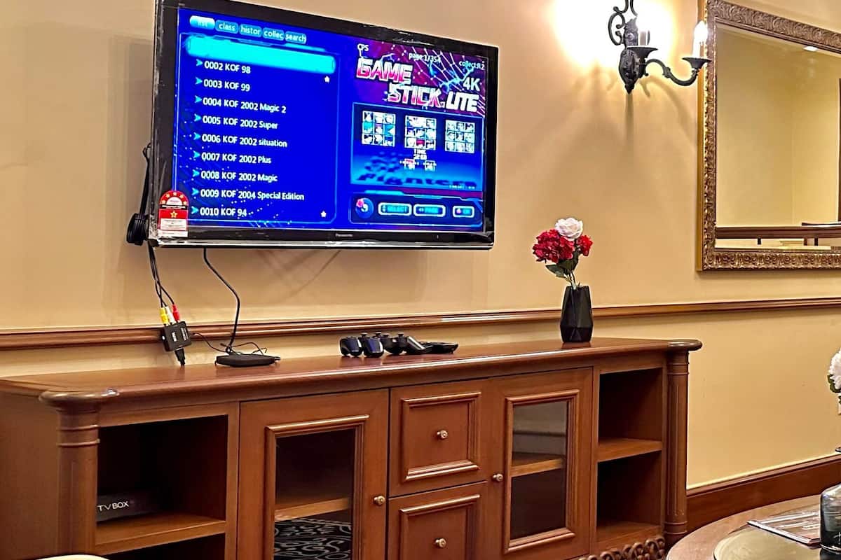 42-inch Smart TV with digital channels, video-game console
