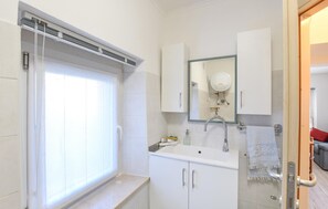 Een douche, een haardroger