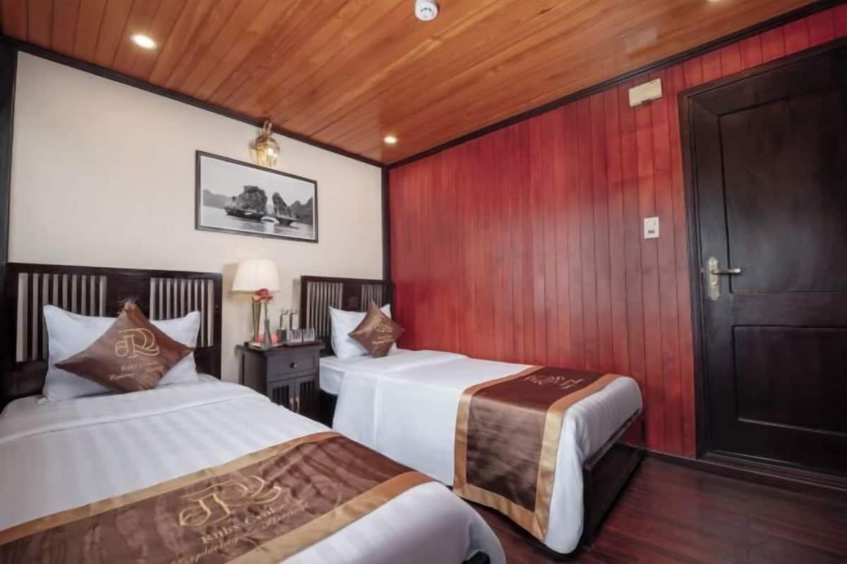 Minibar, desk, bed sheets