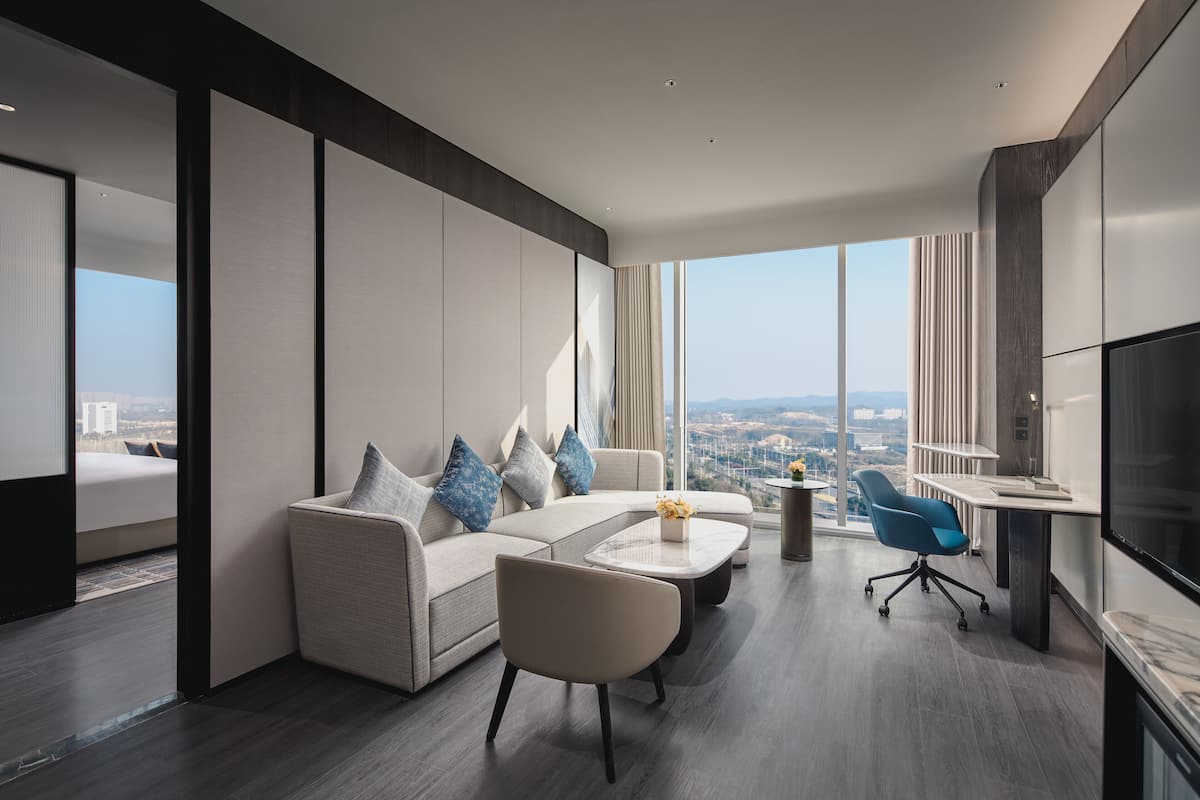 Suite, 1 Bedroom | In-room safe, blackout curtains, iron/ironing board, free WiFi