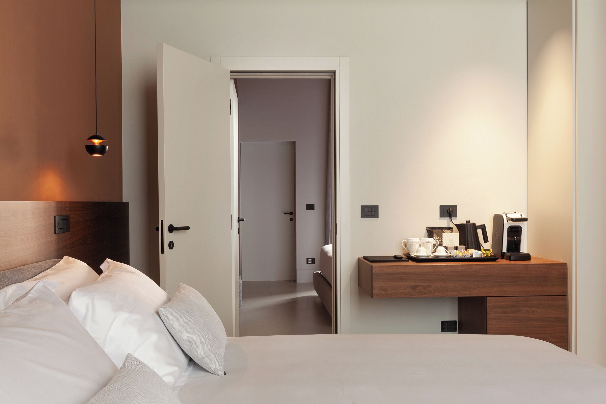 Premium bedding, down comforters, memory foam beds, minibar