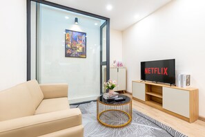 43-inch LCD TV with digital channels, Netflix, streaming services - Yen Boutique Apartments (Hanoi)