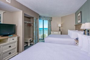 Enjoy ocean views from the comfort of this stylish room, featuring two single beds, a flat-screen TV, and a closet.