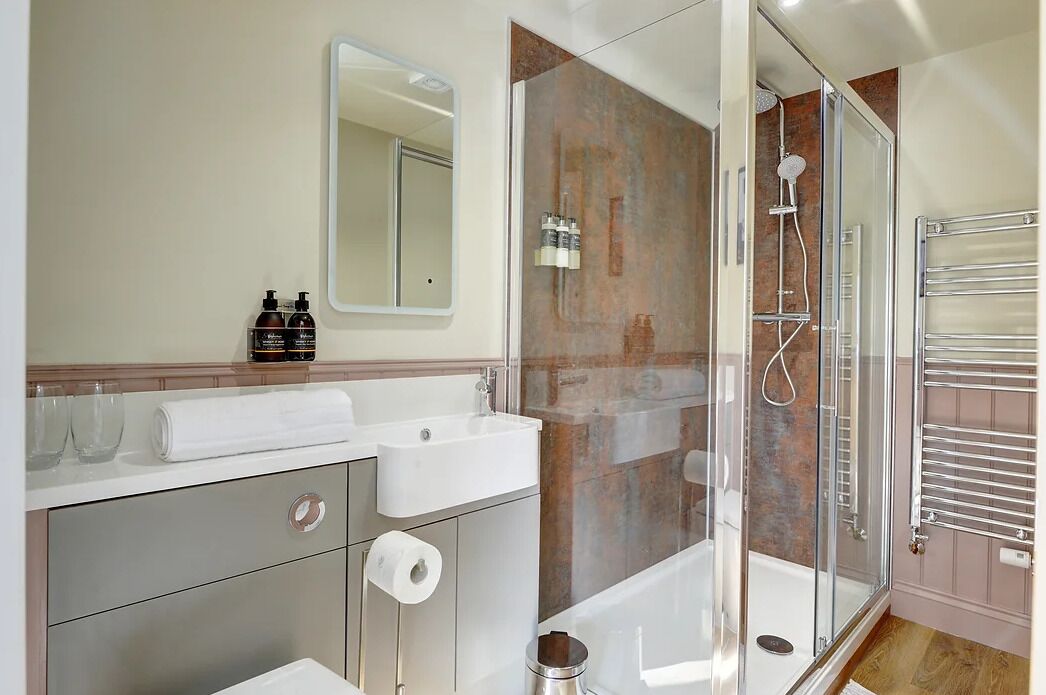 Double Room | Bathroom | Shower, towels, soap, shampoo