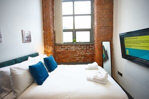 2 dormitorios, tabla de planchar con plancha, cuna de viaje y wifi