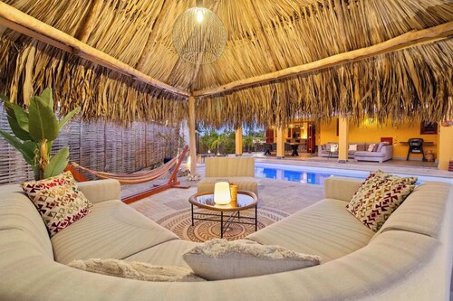Kas Pura Vida with a very cozy poolside palapa