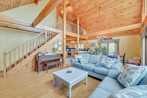 TV, fireplace, ping pong, books - Charming New York Chalet w/ Hot Tub & Game Room! (Preston Hollow)