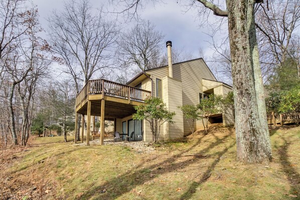 A two-story house with a covered porch and a chimney. - Wintergreen Resort Getaway w/ Deck, Mountain View! (Roseland)