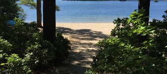 Charming Lakefront Cottage with Screened Porch & Shared Beach Access