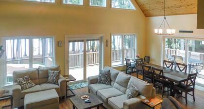 Stunning modern home in peaceful, private setting on desirable Long Lake.