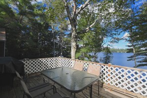 Outdoor dining - Family compound on Thomas Pond featuring main house and two small cottages. (South Casco)