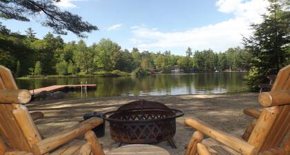 Cozy camp with large sandy beach and excellent views of Little Sebago.