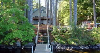 Cozy and contemporary waterfront home in tranquil area on Woods Pond.
