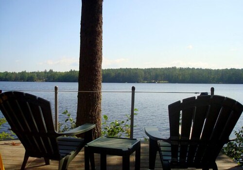 Cozy and contemporary waterfront home in tranquil area on Woods Pond.