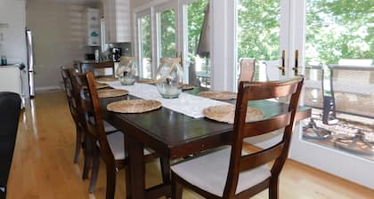 Beautiful home on Sebago Lake Basin with expansive yard and sandy beach!