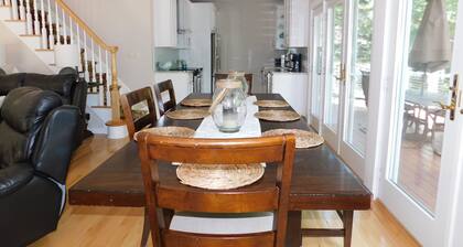 Beautiful home on Sebago Lake Basin with expansive yard and sandy beach!