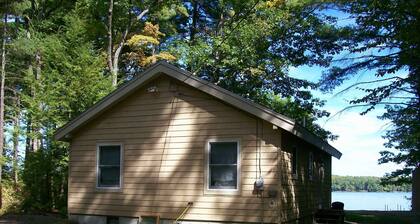 Cozy cottage with excellent views and shallow-entry waterfront on Long Lake.