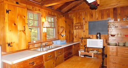 Long Lake chalet and guest house with 200' of water frontage and sunset views