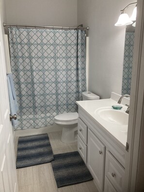 Hair dryer, towels, soap, shampoo