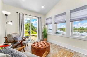 Living area - Fish & Dog Cottage - River-front, private dock & boat launch! (Carrabelle)