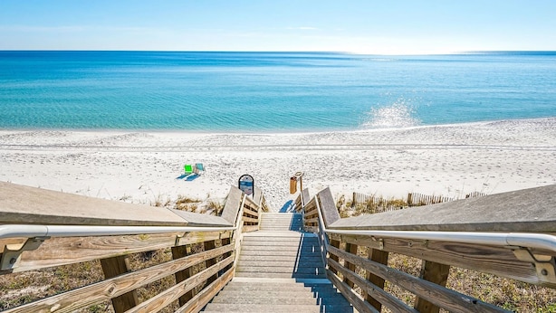A wooden staircase leading to a beach with a clear view of the ocean. - 6-Seater Golf Cart 🚙 Bikes🚲30A Beach and Nature-✌🏼Peace Love & Flip Flops🩴 (Santa Rosa Beach)