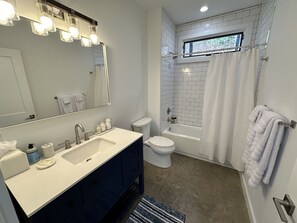 Hair dryer, towels, soap, shampoo
