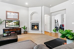 TV, fireplace - Family Home in North Meridian Near Everything (Meridian)