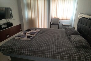 Deluxe Double Room | Free WiFi, bed sheets - Hotel O Apartemen Grand Sentraland by Mira (Karawang)