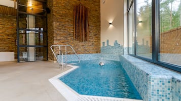 Indoor pool, open noon to 9:00 PM, lifeguards on site