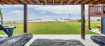 WATERFRONT, pet-friendly retreat with lighted 300’ fishing pier & boat launch!