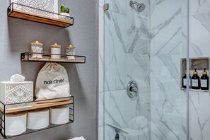 Hair dryer, towels, soap, shampoo