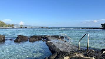 On the beach, sun loungers, beach towels